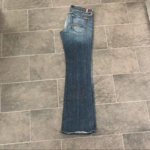 Iconic bootcut jeans. Worn less than five times.